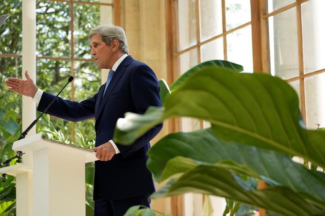 U.S. Special Presidential Envoy for Climate John Kerry delivers a policy speech in the Nash Conservatory at the Royal Botanic Gardens, Kew, in west, London, on a hot sunny day, Tuesday, July 20, 2021. The 19th century glasshouse was originally built in the grounds of Buckingham Palace and moved brick-by-brick to Kew in 1836. Temperatures in London hit 86 degrees Fahrenheit (30 Celsius) on Tuesday. (AP Photo/Matt Dunham)
