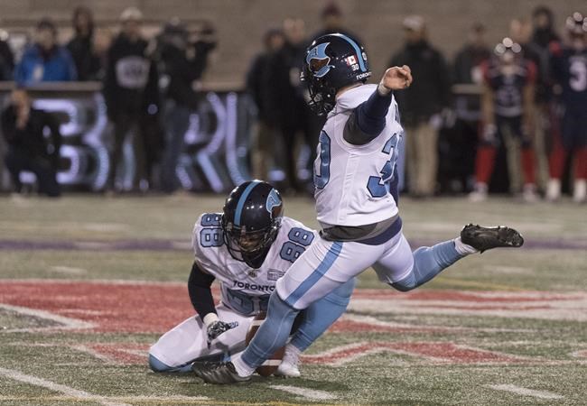 Toronto Argonauts' Tyler Crapigna (30) attempts a field goal in the closing seconds of the second half of a CFL football game against the Montreal Alouettes in Montreal on October 18, 2019. THE CANADIAN PRESS/Graham Hughes