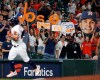 Fans cheer as Houston Astros Jose Altuve rounds the bases after hitting a solo home run off Cleveland Indians starting pitcher Triston McKenzie during the third inning of a baseball game Tuesday, July 20, 2021, in Houston. (Kevin M. Cox/The Galveston County Daily News via AP)