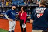YouTube in-game reporter Alanna Rizzo, part of an all-female broadcast crew, interviews Brandon Lowe, left, after the Rays' 9-3 win over the Baltimore Orioles in a baseball game Tuesday, July 20, 2021, in St. Petersburg, Fla. (AP Photo/Steve Nesius)