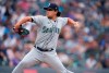 Seattle Mariners starting pitcher Marco Gonzales works against the Colorado Rockies during the first inning of a baseball game Tuesday, July 20, 2021, in Denver. (AP Photo/David Zalubowski)