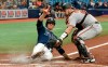 Baltimore Orioles catcher Austin Wynns, right, tags out Tampa Bay Rays' Joey Wendle at the plate during the second inning of a baseball game Wednesday, July 21, 2021, in St. Petersburg, Fla. (AP Photo/Steve Nesius)