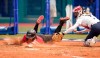 Canada's Joey Lye, left, is tagged by United States' Aubree Munro at home plate during the softball game between the United States and Canada at the 2020 Summer Olympics, Thursday, July 22, 2021, in Fukushima , Japan. (AP Photo/Jae C. Hong)