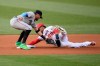 Washington Nationals' Juan Soto steals second against Miami Marlins shortstop Miguel Rojas, left, during the first inning of a baseball game Wednesday, July 21, 2021, in Washington. (AP Photo/Nick Wass)