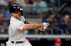 New York Yankees designated hitter Giancarlo Stanton hits an RBI single against the Philadelphia Phillies during the seventh inning of a baseball game Wednesday, July 21, 2021, in New York. (AP Photo/Adam Hunger)