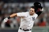 New York Yankees' Ryan LaMarre celebrates after driving in the winning run against the Philadelphia Phillies during the 10th inning of a baseball game Wednesday, July 21, 2021, in New York. The Yankees won 6-5. (AP Photo/Adam Hunger)