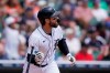 Detroit Tigers' Eric Haase watches his three-run home run to left field during the first inning of a baseball game against the Texas Rangers, Thursday, July 22, 2021, in Detroit. (AP Photo/Carlos Osorio)