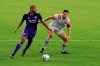 Orlando City forward Tesho Akindele, left, looks to pass the ball as Toronto FC defender Omar Gonzalez defends during the first half of an MLS soccer match, Saturday, May 22, 2021, in Orlando, Fla. THE CANADIAN PRESS/AP, John Raoux