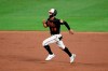 Baltimore Orioles' Ramon Urias runs to third on a throwing error by Washington Nationals relief pitcher Wander Suero on a pickoff attempt during the sixth inning of a baseball game Friday, July 23, 2021, in Baltimore. (AP Photo/Nick Wass)