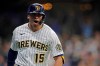 Milwaukee Brewers' Tyrone Taylor reacts after hitting a grand slam during the seventh inning of the team's baseball game against the Chicago White Sox on Friday, July 23, 2021, in Milwaukee. (AP Photo/Aaron Gash)