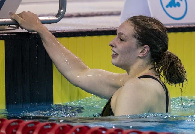 Penny Oleksiak reacts after winning the Women’s 100m Freestyle at the Olympic Swimming Trials in Toronto on June 22, 2021. Five years removed from her record-setting performance at the 2016 Rio Games as a 16-year-old, Olympic champion Oleksiak looks to shine again on the sport’s biggest stage. THE CANADIAN PRESS/Frank Gunn