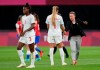 Canada's coach Bev Priestman, right, congratulates her players at the end of a women's soccer match against Chile at the 2020 Summer Olympics, Saturday, July 24, 2021, in Sapporo, Japan. Canada won 2-1. THE CANADIAN PRESS/AP, Silvia Izquierdo