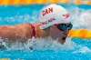 Margaret Mac Neil, of Canada, swims in a heat for the women's 100-meter butterfly at the 2020 Summer Olympics, Saturday, July 24, 2021, in Tokyo, Japan. THE CANADIAN PRESS/AP, Martin Meissner