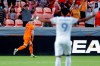 Houston Dynamo forward Tyler Pasher (19) celebrates his goal as FC Cincinnati forward Brenner (9) throws up his arms during the first half of an MLS soccer match Saturday, July 3, 2021, in Houston. THE CANADIAN PRESS/AP, Michael Wyke