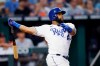 Kansas City Royals' Carlos Santana watches his three-run home run hit to take the lead against the Detroit Tigers in the seventh inning of a baseball game at Kauffman Stadium in Kansas City, Mo., Saturday, July 24, 2021. (AP Photo/Colin E. Braley)