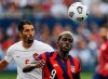 Canada defender Steven Vitoria (5) and U.S. forward Gyasi Zardes (9) chase down the ball during the second half of a CONCACAF Gold Cup soccer match in Kansas City, Kan., Sunday, July 18, 2021.&nbsp;Canada looks to advance to the semifinals of the Gold Cup for the first time since 2007 when it takes on Costa Rica on Sunday night at AT&T Stadium.&nbsp;THE CANADIAN PRESS/AP/Colin E. Braley