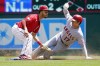 Los Angeles Angels' Shohei Ohtani (17) is tagged out at second on a steal attempt by Minnesota Twins shortstop Andrelton Simmons in the first inning of a baseball game, Sunday, July 25, 2021, in Minneapolis. (AP Photo/Jim Mone)