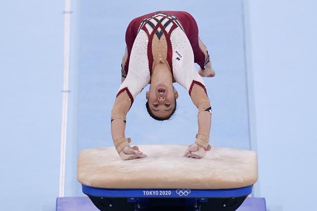 Kim Bui, of Germany, performs on the vault during the women's artistic gymnastic qualifications at the 2020 Summer Olympics, Sunday, July 25, 2021, in Tokyo. (AP Photo/Gregory Bull)