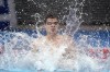 Evgeny Rylov of the Russian Olympic Committee celebrates after winning the final of the men's 100-meter backstroke final at the 2020 Summer Olympics, Tuesday, July 27, 2021, in Tokyo, Japan. (AP Photo/Martin Meissner)