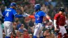 Toronto Blue Jays' Bo Bichette, center, is congratulated by George Springer (4) after his two-run home run off Boston Red Sox starting pitcher Nick Pivetta in the fifth inning of a baseball game at Fenway Park, Monday, July 26, 2021, in Boston. At right is Boston Red Sox catcher Christian Vazquez. (AP Photo/Charles Krupa)