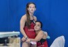 Caeli McKay (left) and Meghan Benfeito comfort each other as they see their fourth place marks in the women’s 10m synchronized diving competition during the Tokyo Olympics in Tokyo, Japan on Tuesday July 27, 2020. THE CANADIAN PRESS/ Frank Gunn