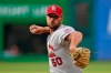 St. Louis Cardinals starting pitcher Adam Wainwright delivers in the first inning of the team's baseball game against the Cleveland Indians, Tuesday, July 27, 2021, in Cleveland. (AP Photo/Tony Dejak)
