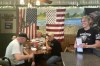 Pauline Bauer, right, speaks with customers from left, Ron Stevenson, 68, of Jamestown, N.Y., his cousin Glenn Robinson, 68, of Kane, Pa., and his half-brother Paul Boedecker, 71, of Warren, Pa., at Bauer’s restaurant, Bob’s Trading Post, Wednesday, July 21, 2021, in Hamilton, Pa. Bauer is one of more than 540 people charged with federal crimes stemming from the Jan. 6 riot at the U.S. Capitol. (AP Photo/Michael Kunzelman)
