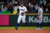 Seattle Mariners' Abraham Toro rounds the bases after hitting a two-run home run against the Houston Astros during the ninth inning of a baseball game, Tuesday, July 27, 2021, in Seattle. Toro was traded to the Mariners from the Astros earlier in the day. The Astros won 8-6. (AP Photo/Ted S. Warren)