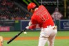 Los Angeles Angels' Shohei Ohtani hits a two-run home run during the sixth inning of a baseball game against the Colorado Rockies Tuesday, July 27, 2021, in Anaheim, Calif. (AP Photo/Mark J. Terrill)