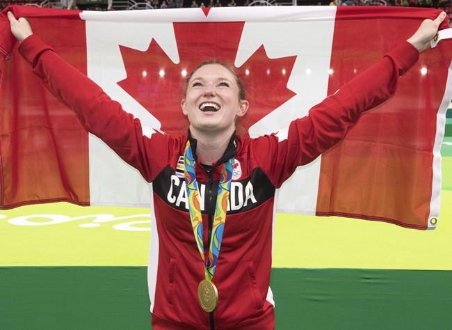 Canada's Rosie MacLennan celebrates after winning the gold medal in the trampoline gymnastics competition at the 2016 Summer Olympics Friday, August 12, 2016 in Rio de Janeiro, Brazil.THE CANADIAN PRESS/Ryan Remiorz
