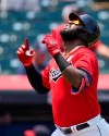 Cleveland Indians' Franmil Reyes celebrates after hitting a solo home run in the second inning of a baseball game against the St. Louis Cardinals, Wednesday, July 28, 2021, in Cleveland. (AP Photo/Tony Dejak)