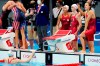 Canada's Penny Oleksiak, left to right, Kayla Sanchez, Summer McIntosh and Rebecca Smith react to their fourth place finish in the women's 4x200m swimming final event during the Tokyo Summer Olympic Games, in Tokyo, Wednesday, July 28, 2021. THE CANADIAN PRESS/Frank Gunn