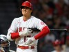 Los Angeles Angels' Shohei Ohtani reacts to a pitch in the fourth inning of the team's baseball game against the Colorado Rockies Wednesday, July 28, 2021, in Anaheim, Calif. (AP Photo/John McCoy)
