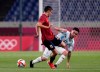 Spain's Pedri Gonzalez, left, and Argentina's Esequiel Barco battle for the ball during a men's soccer match at the 2020 Summer Olympics, Wednesday, July 28, 2021, in Saitama, Japan. (AP Photo/Martin Mejia)