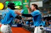 Tampa Bay Rays' Austin Meadows (17) celebrates his solo home run against the New York Yankees with Brett Phillips during the sixth inning of a baseball game Thursday, July 29, 2021, in St. Petersburg, Fla. (AP Photo/Chris O'Meara)