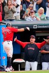 Cleveland Indians manager Terry Francona, right, congratulates Cesar Hernandez on his three-run home run during the fourth inning of the team's baseball game against the Kansas City Royals, Saturday, July 10, 2021, in Cleveland. (AP Photo/Tony Dejak)