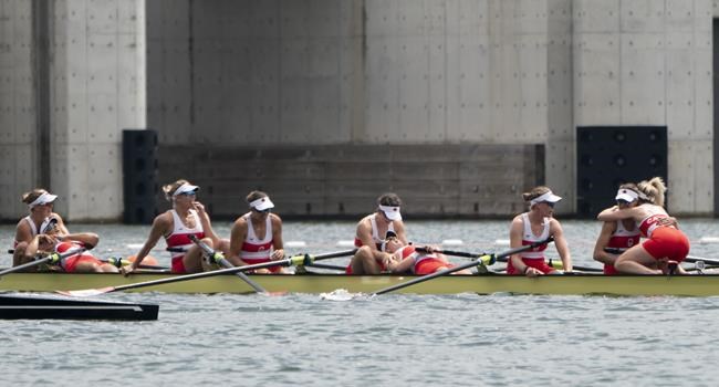 Canada’s Lisa Roman, left to right, Kasia Gruchalla-Wesierski, Christine Roper, Andrea Proske, Susanne Grainger, Madison Mailey, Sydney Payne, Avalon Wasteneys and Kristen Kit celebrate after winning the gold medal in women's eight rowing competition at the Tokyo Olympics, Friday, July 30, 2021 in Tokyo, Japan. THE CANADIAN PRESS/Adrian Wyld