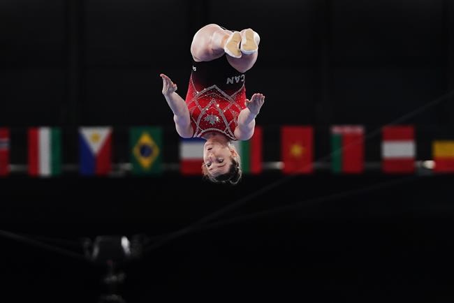 Rosie MacLennan of Canada competes in the women's trampoline gymnastics qualification during the Tokyo Summer Olympic Games, in Tokyo, Friday, July 30, 2021. THE CANADIAN PRESS/Nathan Denette