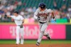Houston Astros' Myles Straw takes off from second base to score on a double by Martin Maldonado during the fourth inning of the team's baseball game against the Seattle Mariners, Tuesday, July 27, 2021, in Seattle. (AP Photo/Ted S. Warren)