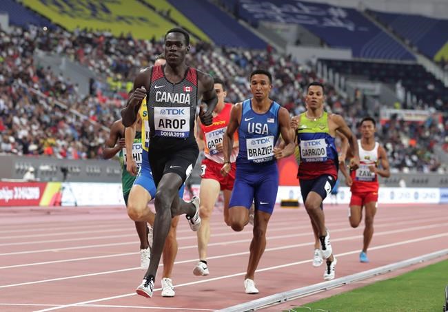 Marco Arop, of Canada, leads Donavan Brazier, of the United States, in a men's 800-metre heat at the World Athletics Championships in Doha, Qatar, Saturday, Sept. 28, 2019. THE CANADIAN PRESS/AP, Hassan Ammar