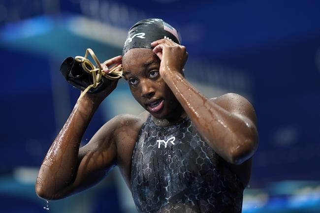 Simone Manuel, of United States, leaves the pool after a women's 50-meter freestyle semifinal at the 2020 Summer Olympics, Saturday, July 31, 2021, in Tokyo, Japan. (AP Photo/David Goldman)