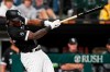 Chicago White Sox's Tim Anderson hits an RBI single during the eighth inning of the team's baseball game against the Cleveland Indians in Chicago, Friday, July 30, 2021. (AP Photo/Nam Y. Huh)