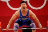 Lyu Xiaojun of China competes in the men's 81kg weightlifting event, at the 2020 Summer Olympics, Saturday, July 31, 2021, in Tokyo, Japan. (AP Photo/Luca Bruno)