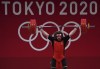 Canada's Boady Santavy competes in the Men’s 96kg Weightlifting finals during the Tokyo Summer Olympic Games, in Tokyo on Saturday, July 31, 2021. Santavy lifted a combined 386 kilograms to take fourth on Saturday in the 96-kilogram weight class at the Tokyo Olympics. THE CANADIAN PRESS/Nathan Denette