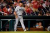 Miami Marlins manager Don Mattingly walks to the mound for a pitching change during the seventh inning of a baseball game against the Washington Nationals, Monday, July 19, 2021, in Washington. (AP Photo/Nick Wass)