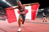 Andre De Grasse of Canada reacts after winning the bronze medal in the Men's 100m final during the summer Tokyo Olympics in Tokyo, Japan on Sunday, August 1, 2021. THE CANADIAN PRESS/Frank Gunn