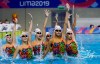 FILE - In this July 25, 2019, file photo, the synchronized swimming team of Cuba performs their routine during a training session at the Pan Am Games in Lima, Peru. Forget boxing or rugby. The most hardcore sport at the Tokyo Games may just be artistic swimming. The sport once known as synchronized swimming has rapidly evolved into one of the most physically grueling specialties at the Olympics. (AP Photo/Fernando Vergara, File)