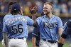 Tampa Bay Rays Austin Meadows celebrates with teammate Randy Arozarena (56) after defeating the Boston Red Sox during a baseball game Sunday, Aug. 1, 2021, in St. Petersburg, Fla. (AP Photo/Scott Audette)