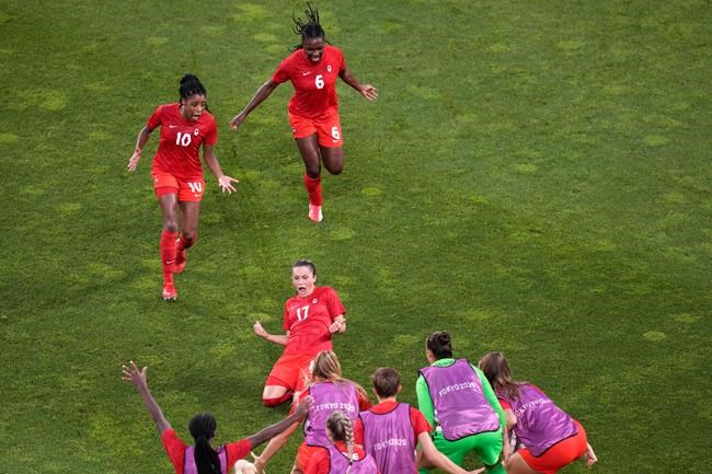 Canada's Jessie Fleming, 17, celebrates scoring the opening goal from the penalty spot during a women's semifinal soccer match against United States at the Tokyo Summer Olympic Games, in Kashima, Japan, Monday, Aug. 2, 2021. Fleming scored on a penalty kick in the 74th minute to help the Canadian women's soccer team to a 1-0 semifinal victory over the United States on Monday at the Tokyo Games. THE CANADIAN PRESS/AP-Martin Mejia