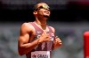 Canada's Andre De Grasse competes in a heat of the men's 200-metres at the 2020 Summer Olympics, Tuesday, Aug. 3, 2021, in Tokyo. (AP Photo/Petr David Josek)